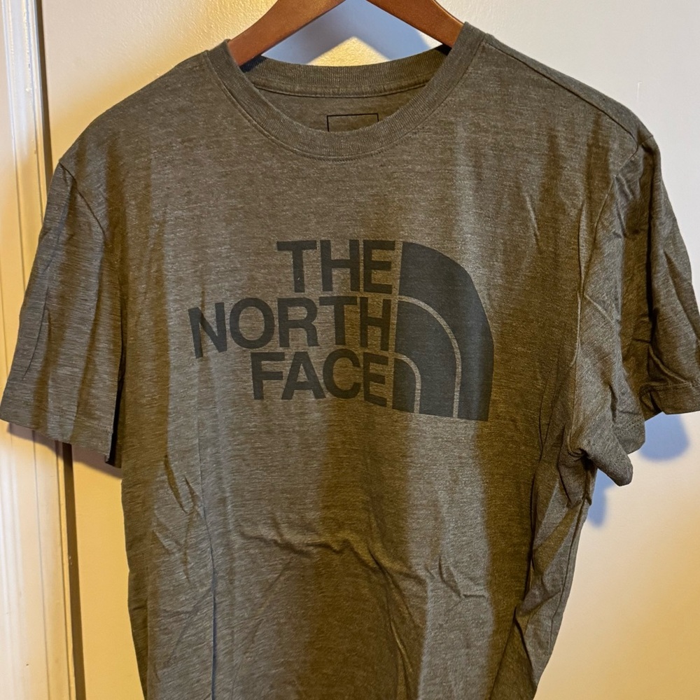 Olive green North Face T-shirt.